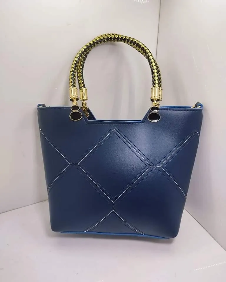 Leather X pattern handbag