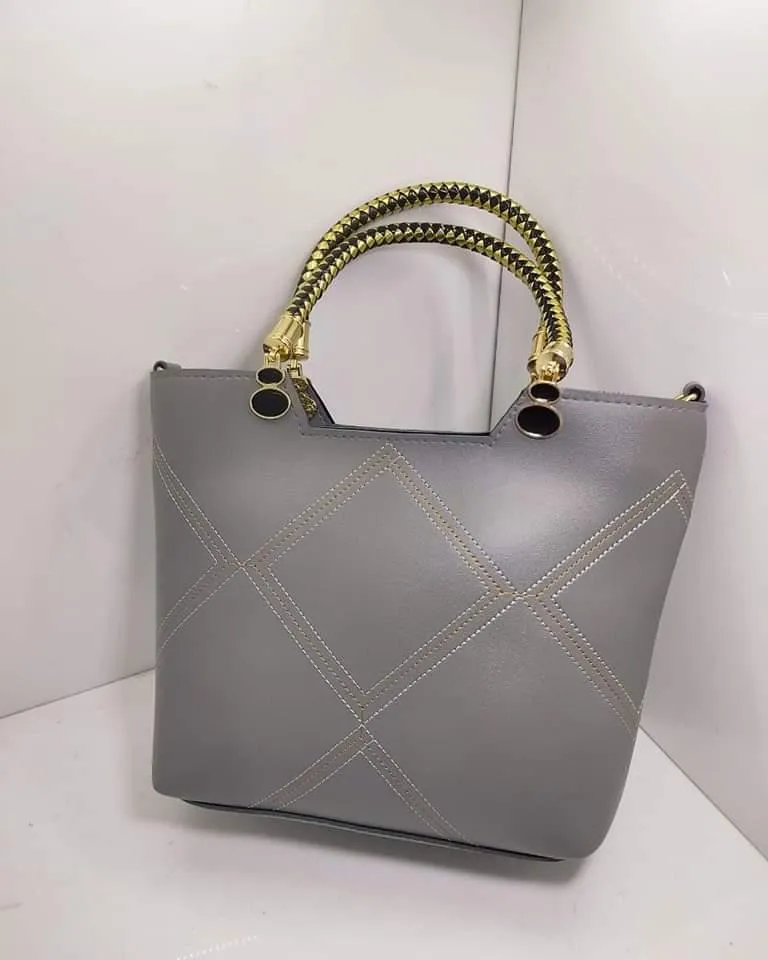 Leather X pattern handbag