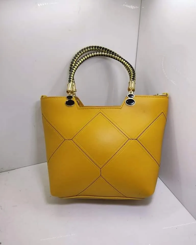 Leather X pattern handbag