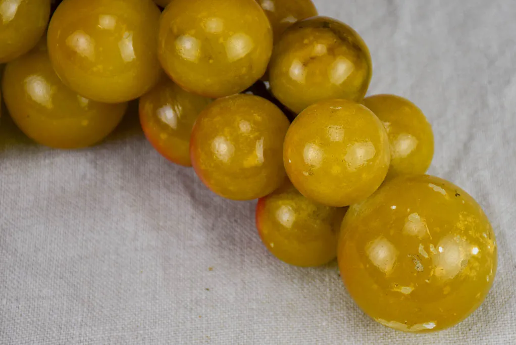 Mid-century alabaster sculpture of oversize grapes on a stem